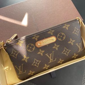 Louis Vuitton wristlet/ mini purse